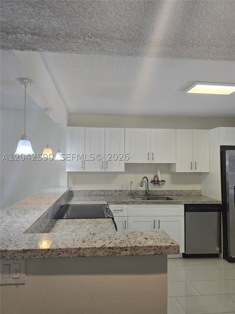 Tiny photo for 16581 Blatt Blvd #104, Weston, FL 33326 (MLS # A12042590)
