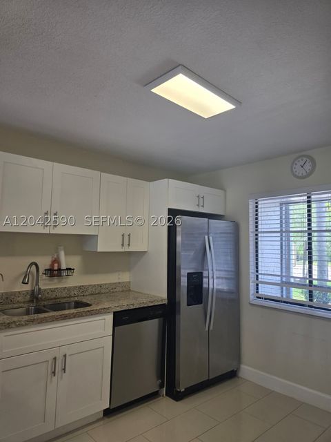 Tiny photo for 16581 Blatt Blvd #104, Weston, FL 33326 (MLS # A12042590)