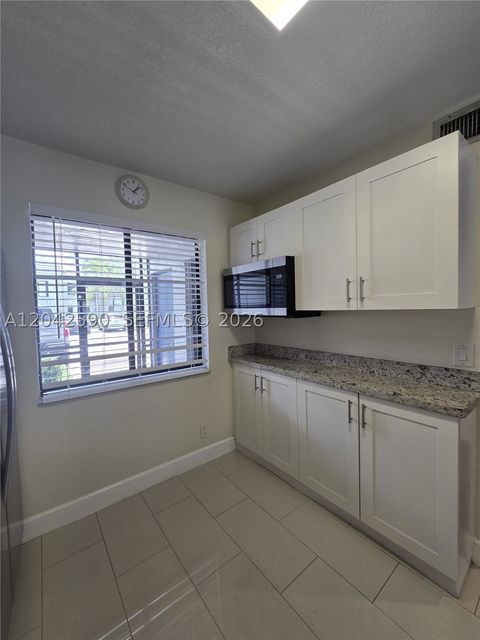 Tiny photo for 16581 Blatt Blvd #104, Weston, FL 33326 (MLS # A12042590)