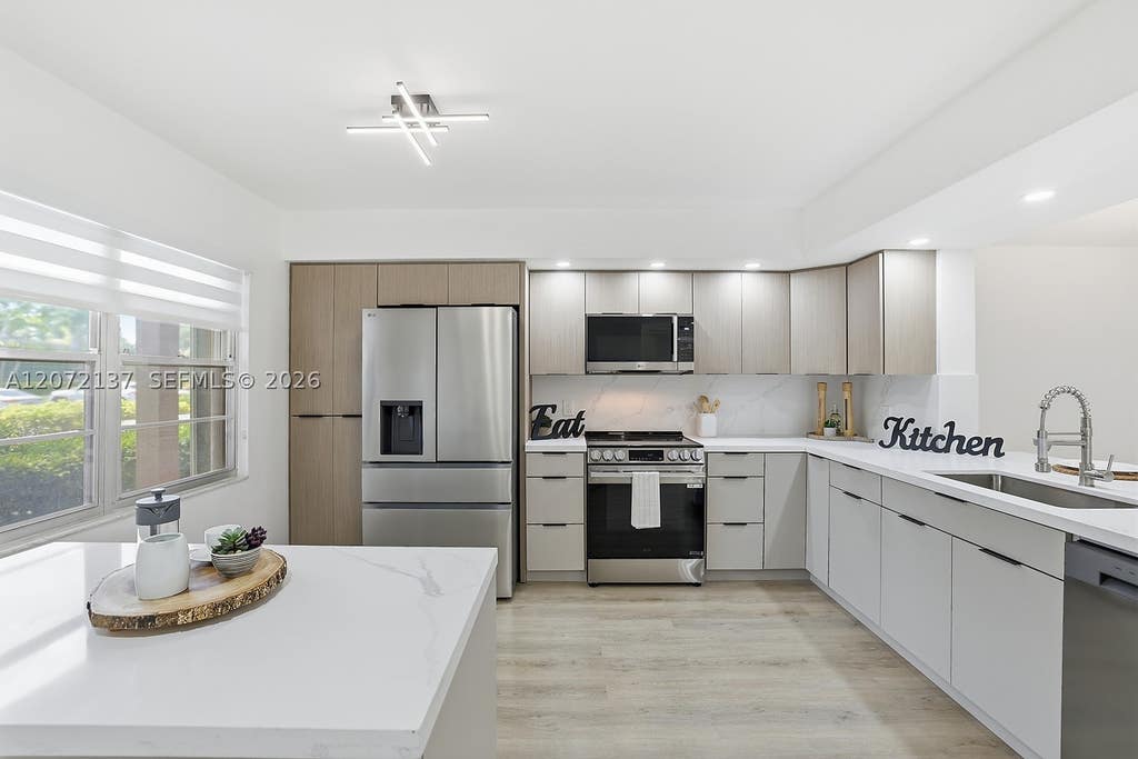 Photo of 300 SW 130th Ter #110B, Pembroke Pines, FL 33027 (MLS # A12072137)
