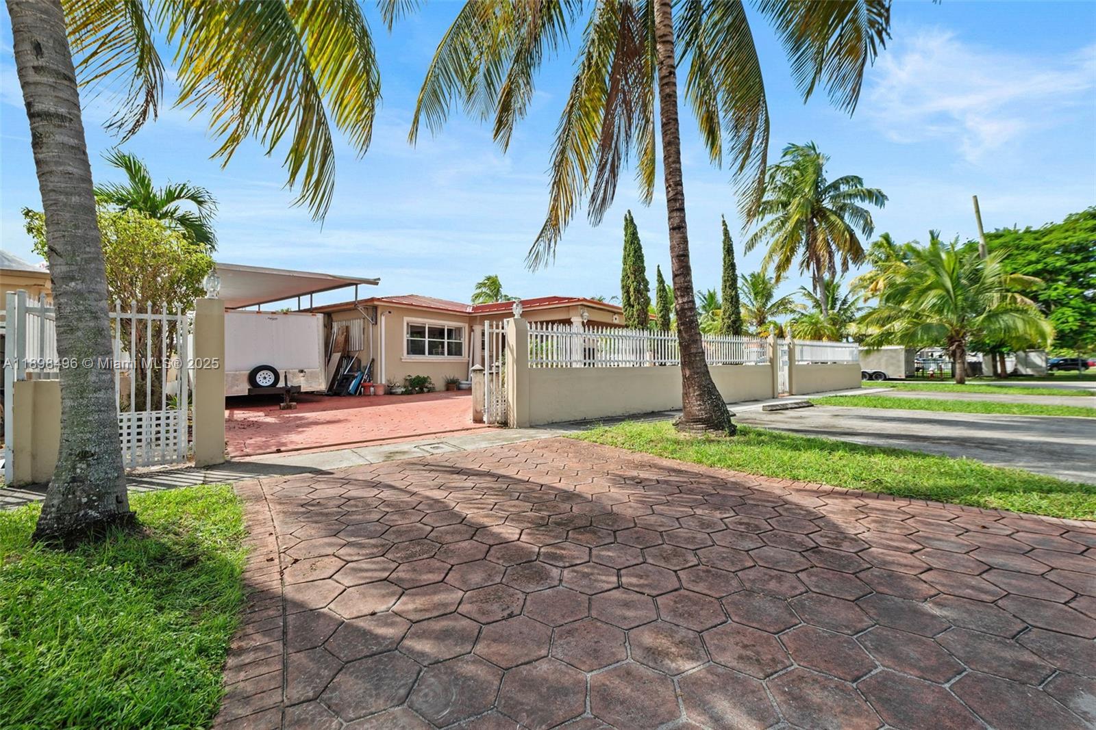 Welcome to City of Hialeah this large single-family home features 5 bedrooms and 5.5 bathrooms, perfectly situated on a generous corner lot with a security gate and circular driveway for added privacy and convenience.
This home offers a two-car garage, New steel roof just recently finished, outdoor entertaining area with a sparkling pool—ideal for family gatherings or relaxing weekends.Inside, you’ll find two kitchens—a secondary prep kitchen and a fully equipped main kitchen designed for all your entertaining,Brand new steel roof, Gas water heater, Don't miss out on this unique opportunity to own a well-appointed home great for a large family to enjoy, in one of Hialeah’s most desirable neighborhoods!