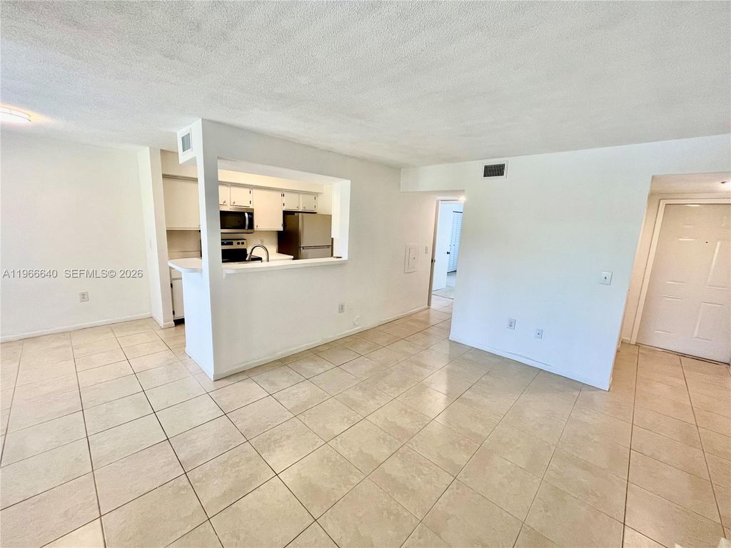 Photo of 815 W Boynton Beach Blvd #4-105, Boynton Beach, FL 33426 (MLS # A11966640)