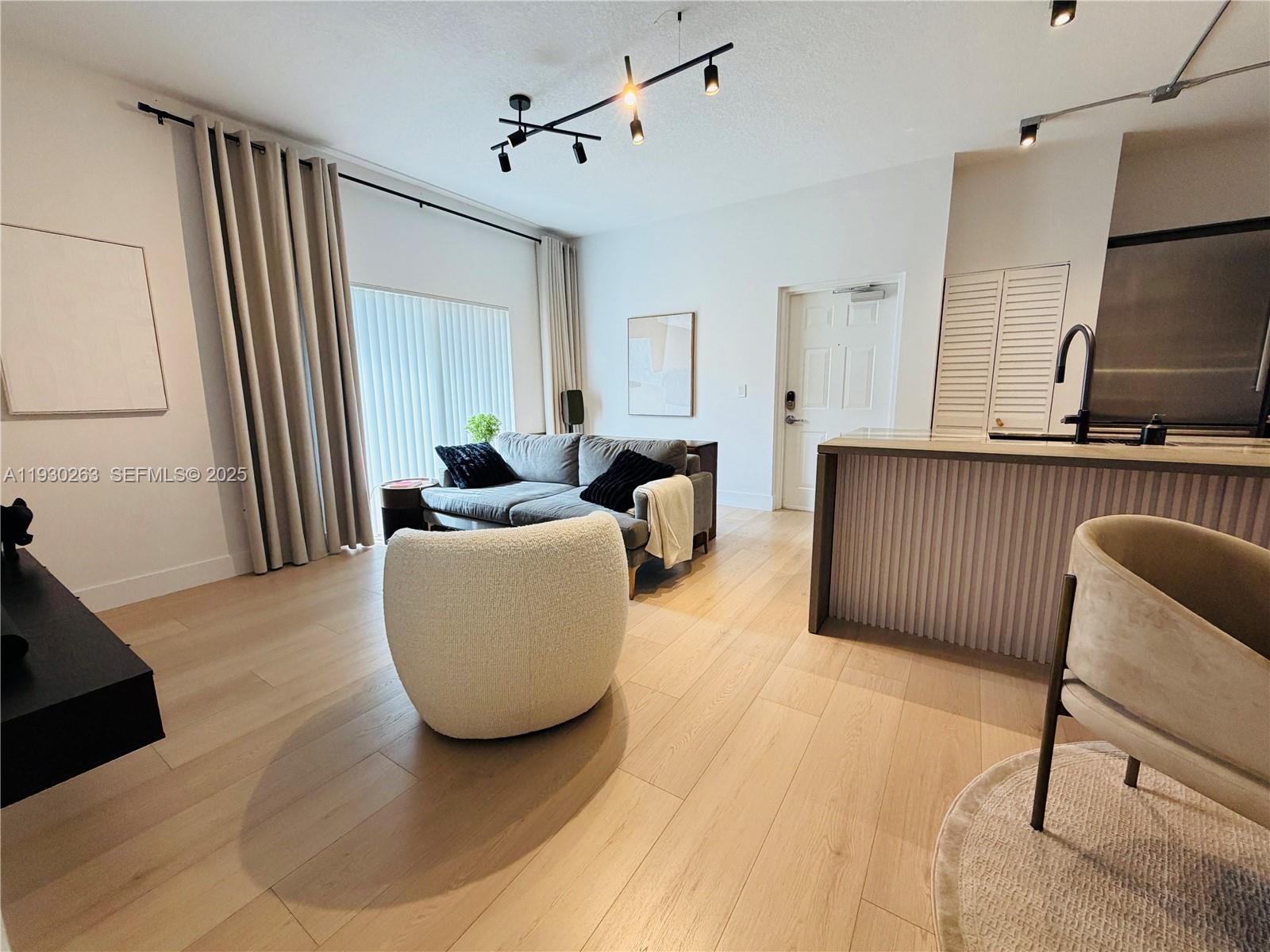 PALM GARDENS AT DORAL CON - Residential Lease