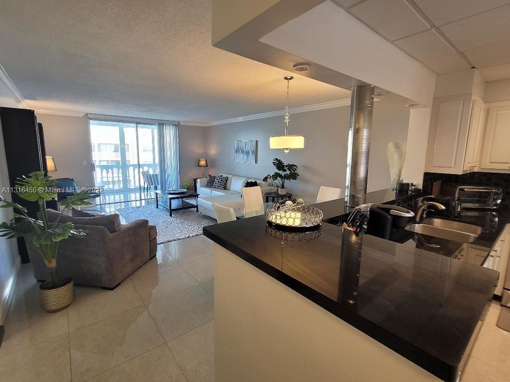Photo of 610 NE 12th Ave #401, Hallandale Beach, FL 33009 (MLS # A11316455)