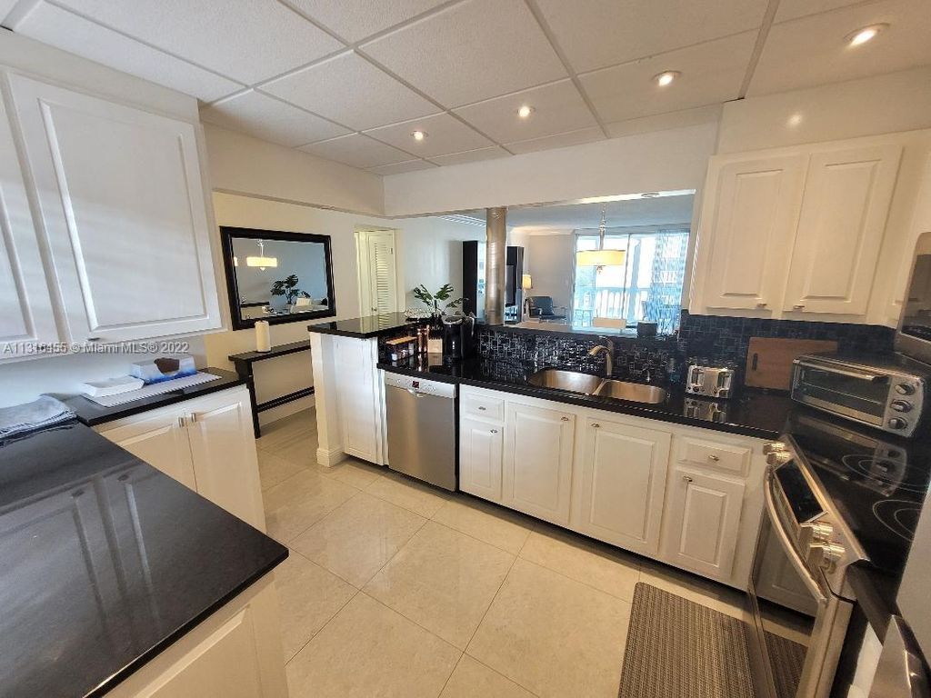 Photo of 610 NE 12th Ave #401, Hallandale Beach, FL 33009 (MLS # A11316455)