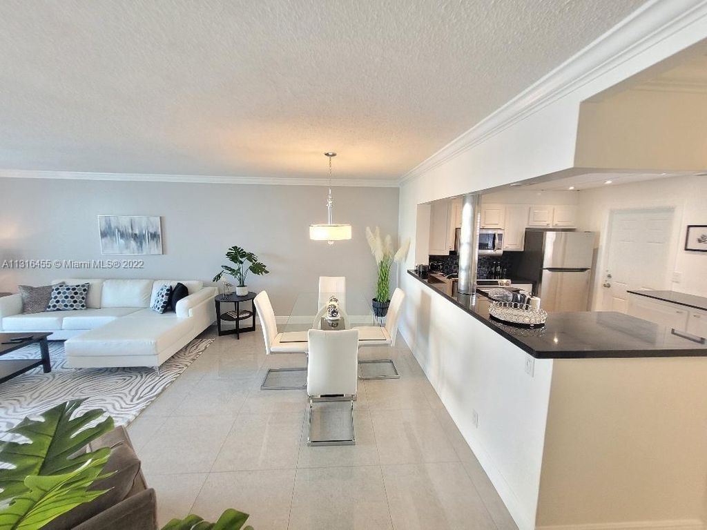 Photo of 610 NE 12th Ave #401, Hallandale Beach, FL 33009 (MLS # A11316455)