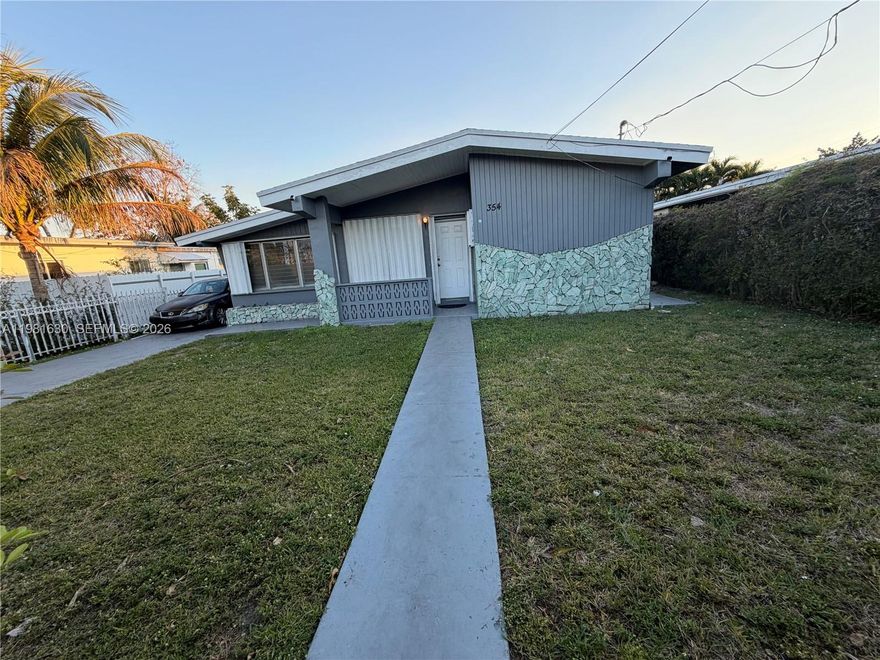 Welcome to this beautifully updated 3-bedroom, 2-bath home in the highly desirable North Miami Beach area. Offering 1,326 square feet of living space, this move-in-ready residence has been recently renovated and freshly painted, creating a clean and inviting feel throughout. The updated kitchen features newer appliances and a functional layout that works well for both everyday living and entertaining. Outside, the property is framed by large privacy hedges that enhance the sense of seclusion and curb appeal. Accordion hurricane shutters provide added convenience and peace of mind. Ideally located near shopping, dining, major roadways, and everything North Miami Beach has to offer, this home is an excellent opportunity for buyers seeking comfort, style, and location. Call or text listing agent for additional information. Please schedule showings via ShowingTime.