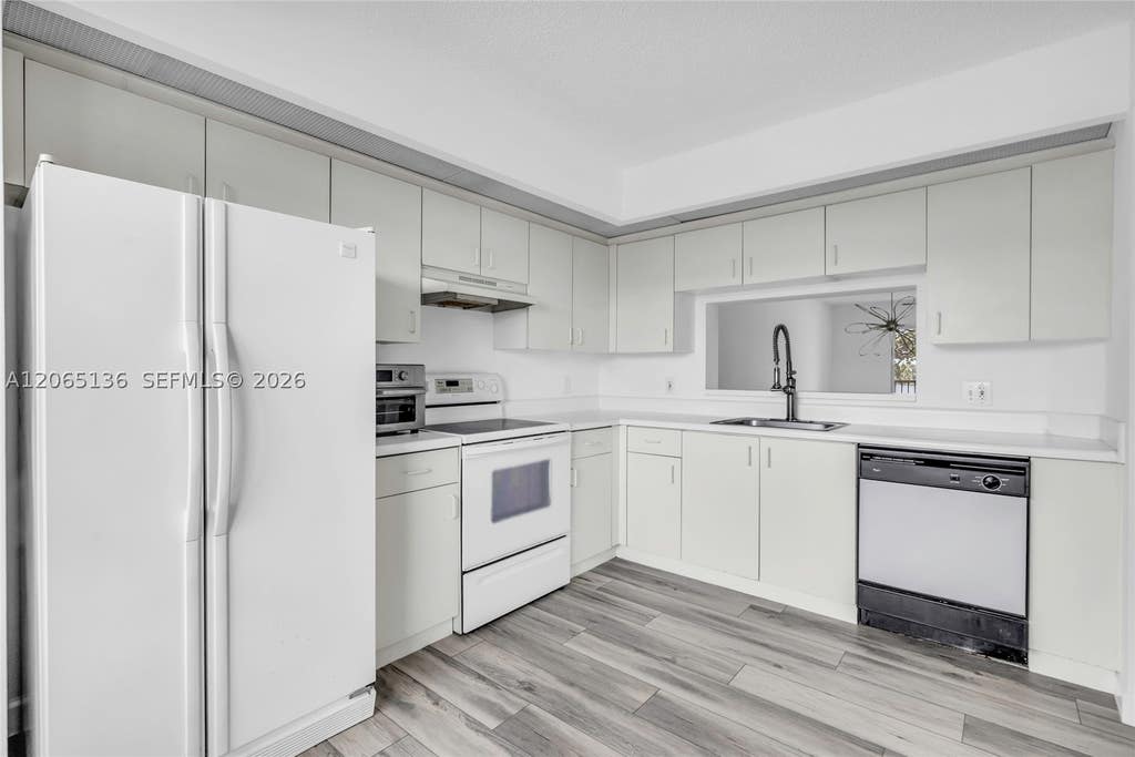 Photo of 550 SW 138th Ave #309K, Pembroke Pines, FL 33027 (MLS # A12065136)