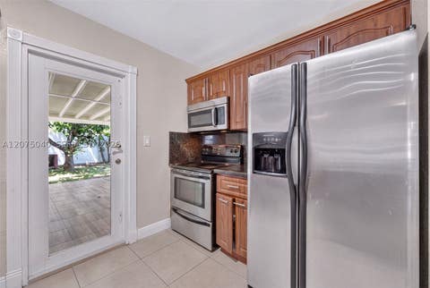 Tiny photo for 15850 NW 18th Pl, Miami Gardens, FL 33054 (MLS # A12075040)