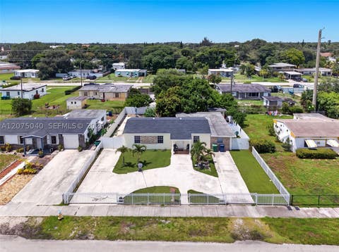 Tiny photo for 15850 NW 18th Pl, Miami Gardens, FL 33054 (MLS # A12075040)