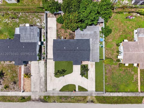 Tiny photo for 15850 NW 18th Pl, Miami Gardens, FL 33054 (MLS # A12075040)