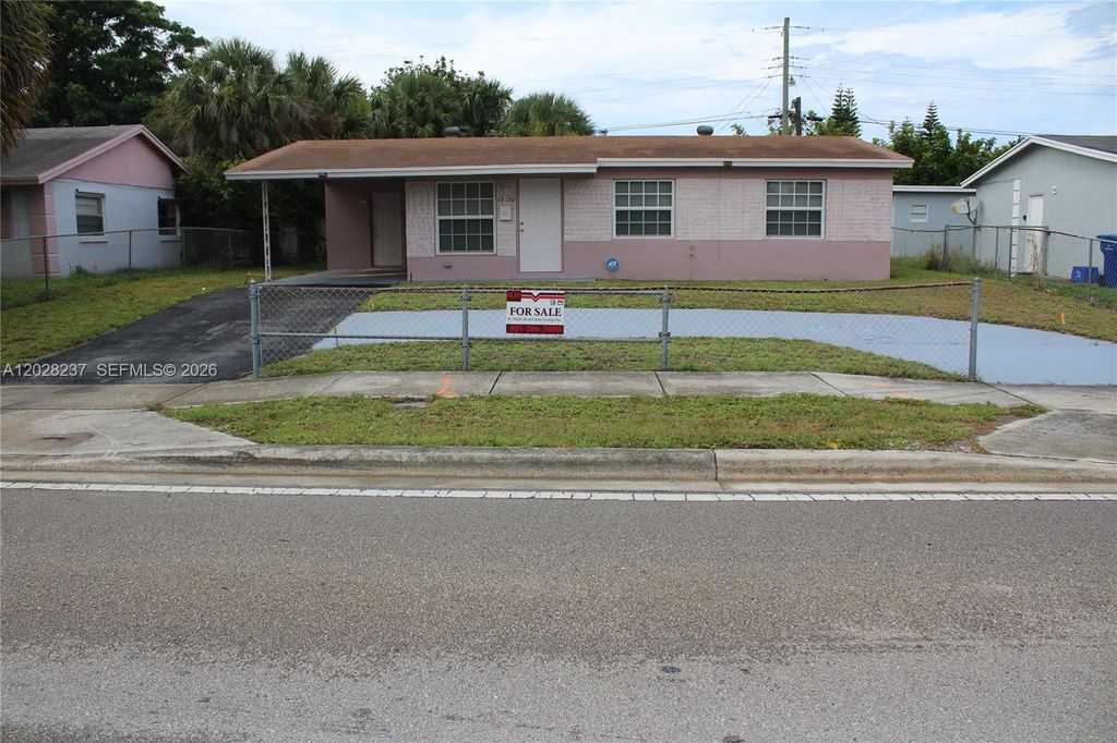 Photo of 1570 W 13th St, Riviera Beach, FL 33404 (MLS # A12028237)