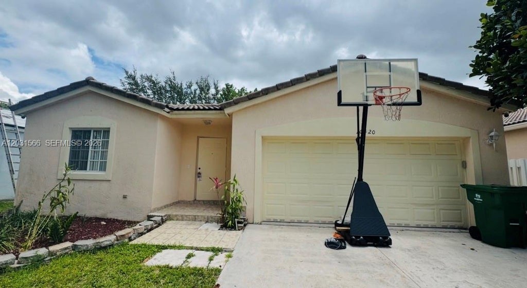 Photo of 10420 SW 24th Ct, Miramar, FL 33025 (MLS # A12031566)