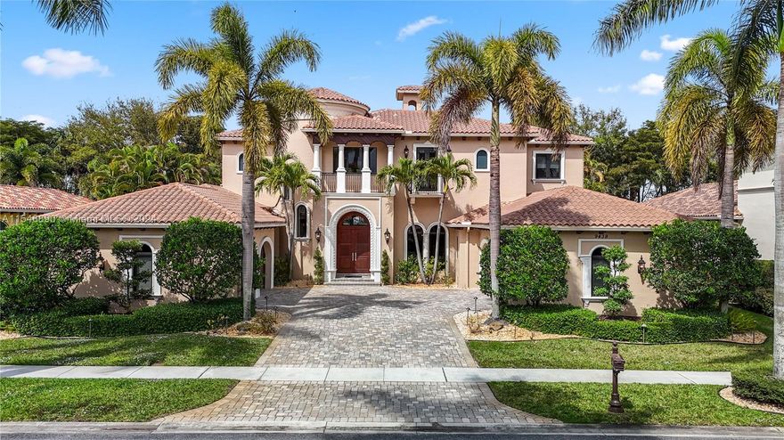Nestled within the picturesque Grand Estates of the esteemed guard-gated community of The Oaks, this stunning Boca Beauty residence awaits. Built in 2006, the luxurious Smart Home boasts 6 beds, 9 baths, an impressive 6,500 SF of living space, and 8,000+ total SF all situated on an expansive 15,000 SF lot. The grandeur of the home is highlighted by a superb master suite on the first floor, w/separate his and hers bathrooms and closets. Features include impact windows/doors, whole house generator, salt-water heated pool, mosquito misting system, and a 4-car garage. Upstairs, a sprawling kids' play area awaits, accompanied by 4 additional bedrooms, offering the perfect blend of elegance and comfort for the discerning homeowner.