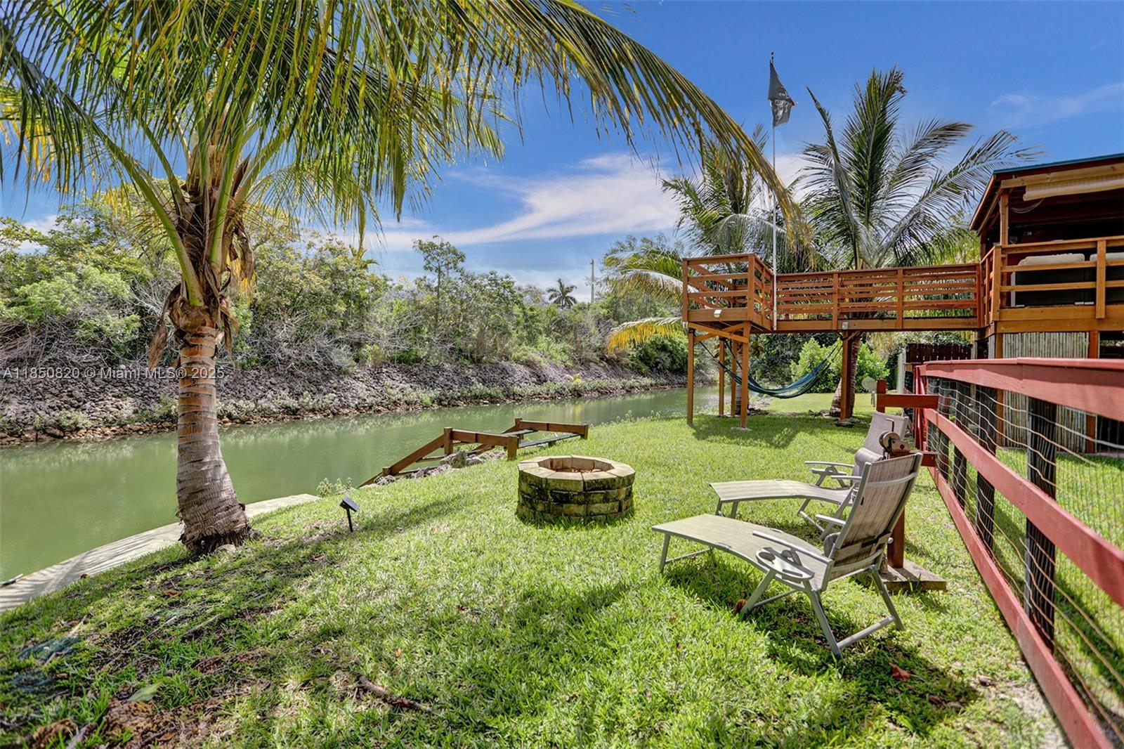 Doesn't get better than THIS! Come home everyday to your own PRIVATE OASIS! Located at the end of a no-thru street. This property is very private with only one direct neighbor, a canal running along the back and side of the property, and no back neighbor. Plenty of parking in the front of the home and a driveway leading up to a carport. Perfect for entertaining and relaxing a the end of the day. This 3b/2b-home boasts laminate floors throughout, waster/dryer, covered patio deck with tranquil pond, large backyard, outdoor seating area, a one of a kind 2-story "clubhouse/fort" with spa on the bottom level, entertaining area, and observatory, and so much more! A MUST SEE!!! Schedule a showing TODAY! Available to start Oct. 1, 2025.