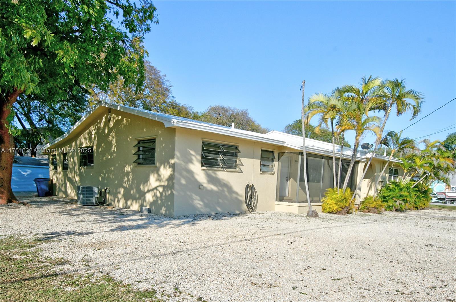 Exceptional location in coveted Largo Sound Park. Unique property is cleverly laid out. Left structure has 3 bedrooms, 2 baths, a full kitchen, a living room, and a bonus room/Florida room. The right side has a separate entrance, kitchenette, office, bath, recreation room and garage. Situated on 2 lots in the X-Zone (highest elevation in the Florida Keys). Plus, 2 other cleared lots right next door are also for sale and can be bought along with this home at $279,000 per lot. Bought all together gives nearly ½ an acre of property. Voluntary waterfront homeowners park with boat ramp & Beach. Close to Adams Cut. Close to school, shopping, restaurants, and easy commute to Miami. SALE OF PROPERTY SUBJECT TO COURT APPROVAL.