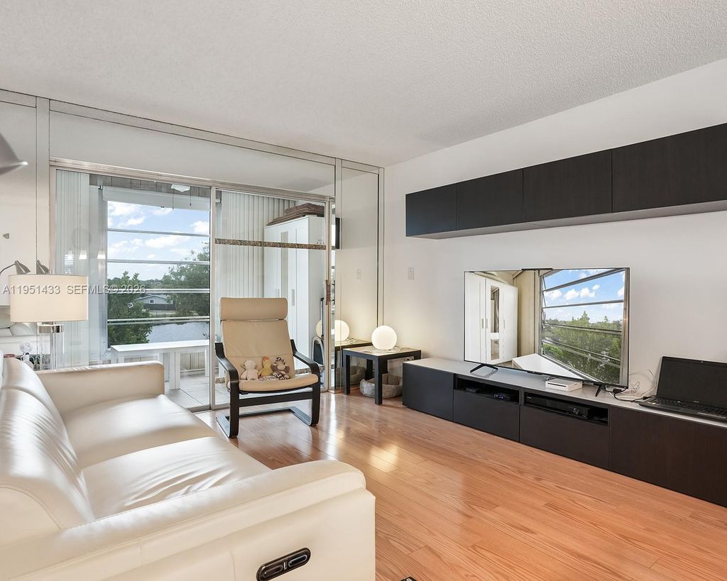 Photo of 9370 Sunrise Lakes Blvd #308, Sunrise, FL 33322 (MLS # A11951433)