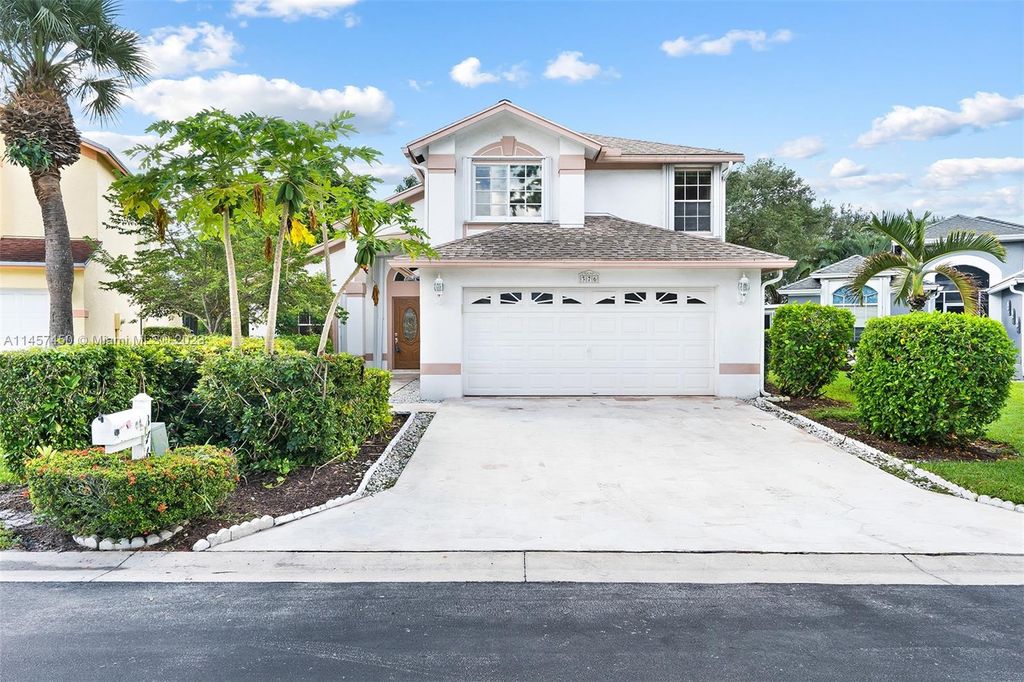 Photo of 376 Hammocks Trl, Green Acres, FL 33413 (MLS # A11457450)