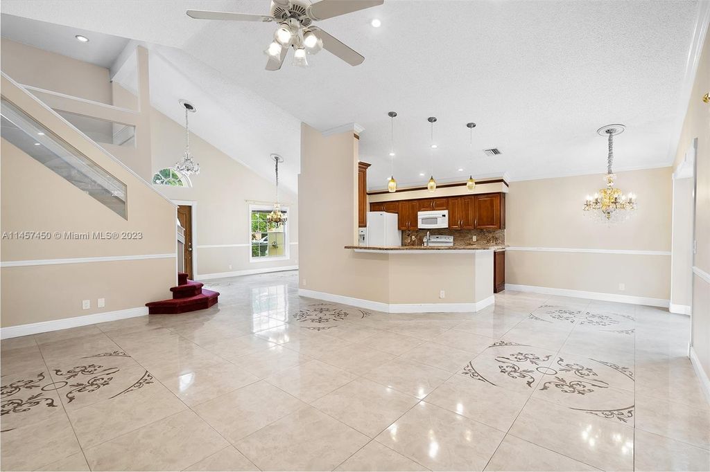 Photo of 376 Hammocks Trl, Green Acres, FL 33413 (MLS # A11457450)