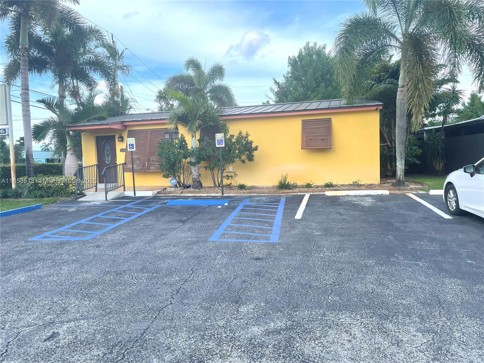 Prime Freestanding Office Building for Sale
Discover a high-visibility corner office property in the heart of Hollywood, FL. This 933 SF freestanding commercial building features three private offices, a spacious open workspace, a reception area, kitchen, ADA-compliant restroom, and parking for four vehicles—including two ADA spaces. Recently updated with a metal roof, security system, sprinkler system, and lush landscaping. Zoned C and ideal for medical, legal, professional, or service-based businesses. Excellent location with easy access to major roads, perfect for owner-users or investors. CALL FOR SHOWINGS