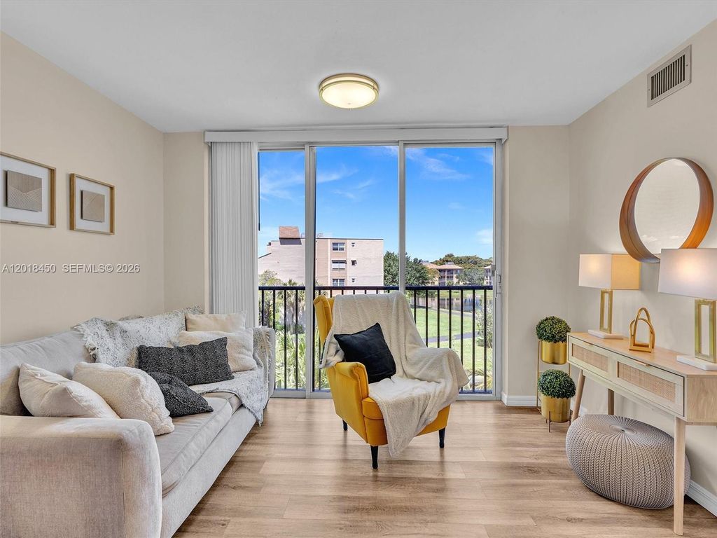 Photo of 7840 NW 50th St #404, Lauderhill, FL 33351 (MLS # A12018450)