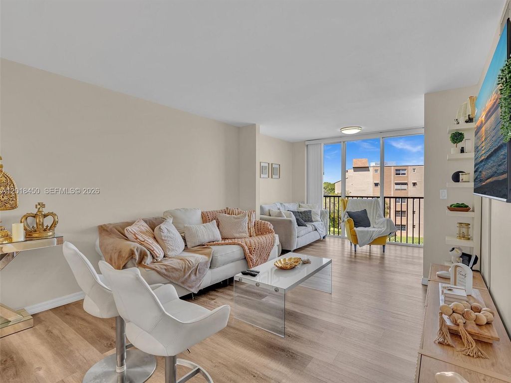 Photo of 7840 NW 50th St #404, Lauderhill, FL 33351 (MLS # A12018450)