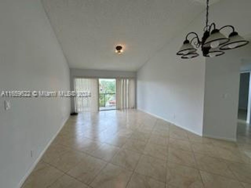 Photo of 8955 Wiles Rd #308, Coral Springs, FL 33067 (MLS # A11659622)