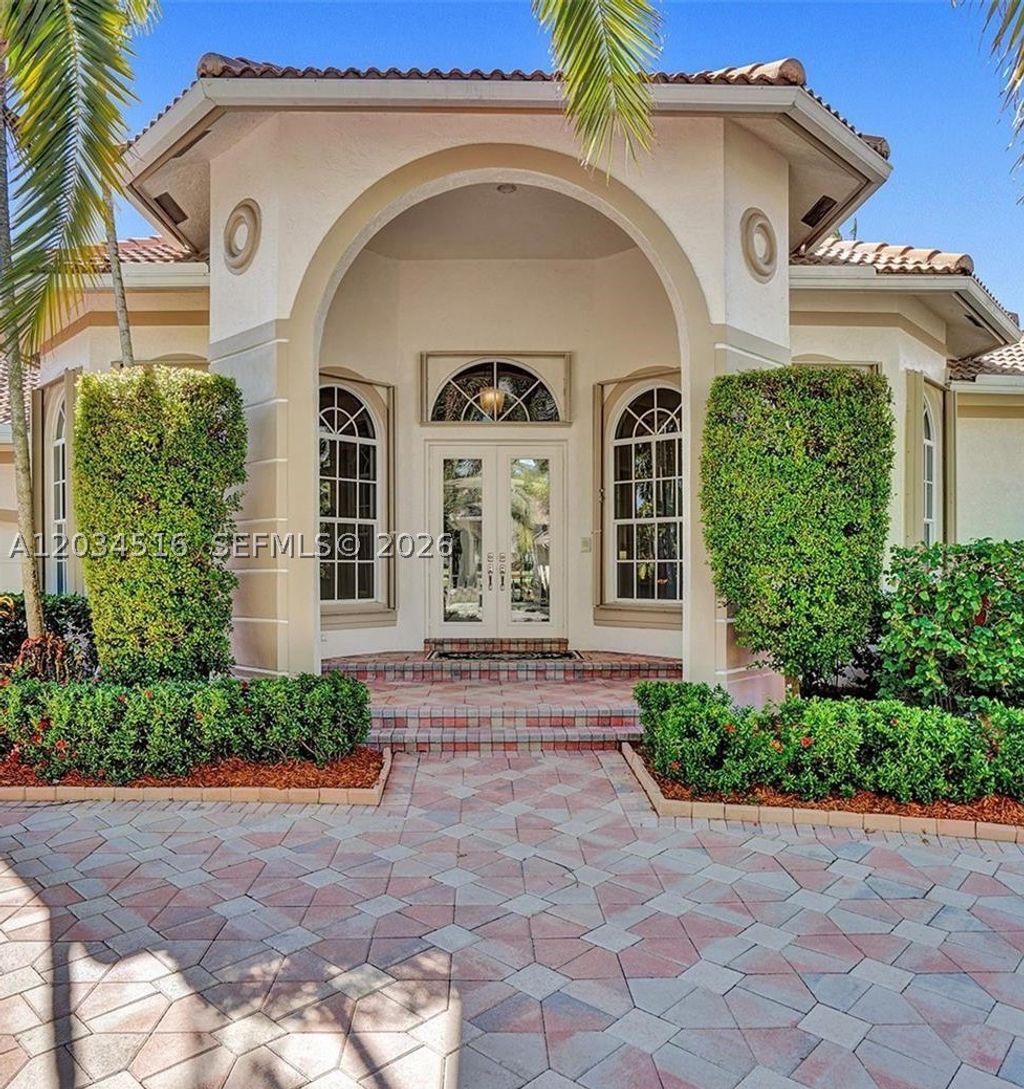 Photo of 2501 Poinciana Dr, Weston, FL 33327 (MLS # A12034516)