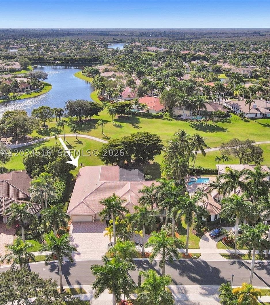 Photo of 2501 Poinciana Dr, Weston, FL 33327 (MLS # A12034516)