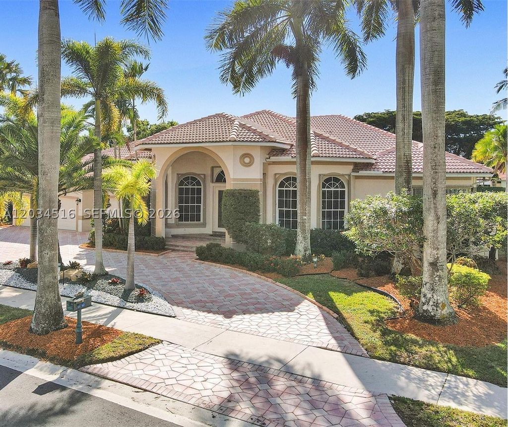 Photo of 2501 Poinciana Dr, Weston, FL 33327 (MLS # A12034516)