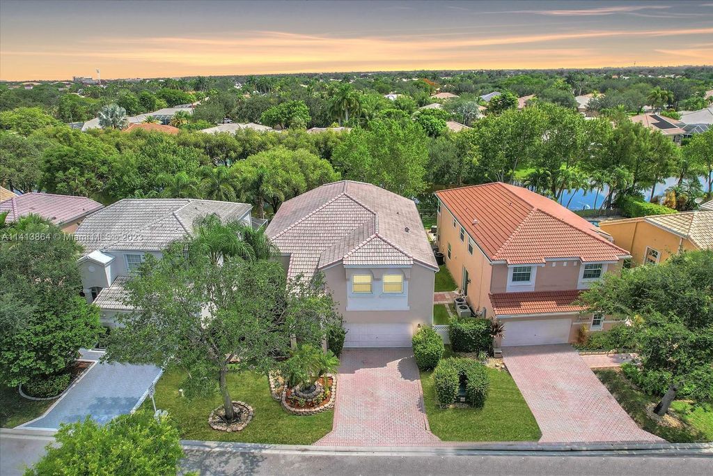Photo of 11445 NW 49th Dr, Coral Springs, FL 33076 (MLS # A11413864)