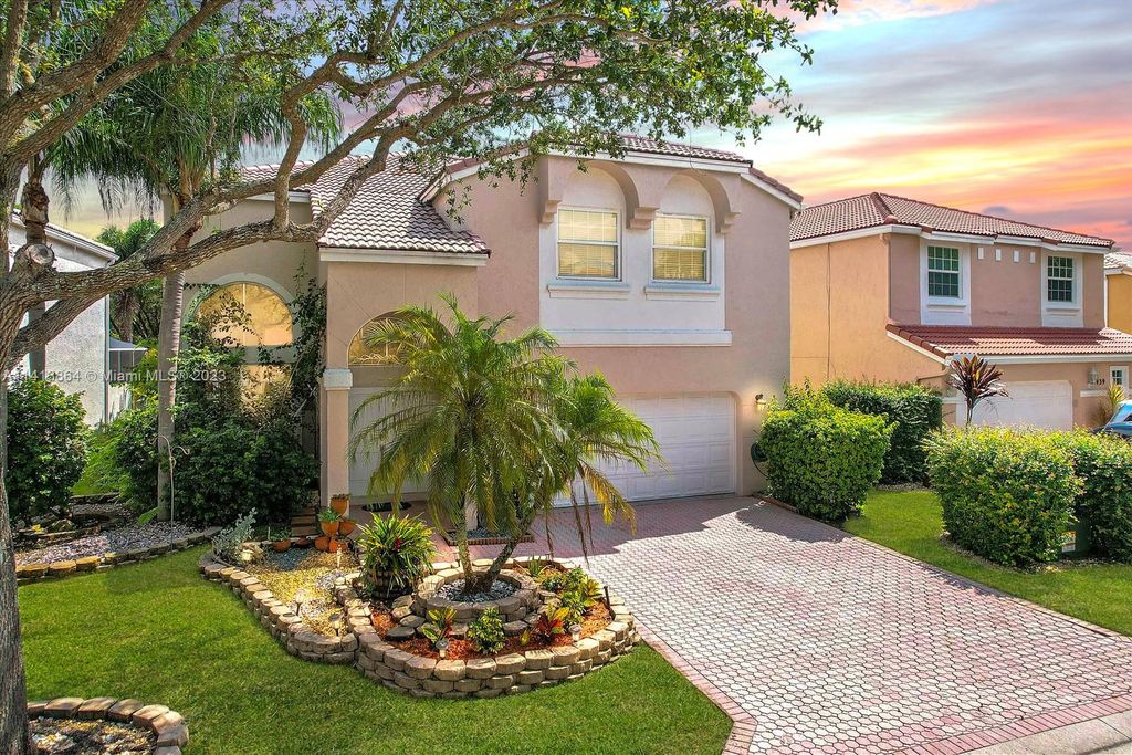 Photo of 11445 NW 49th Dr, Coral Springs, FL 33076 (MLS # A11413864)