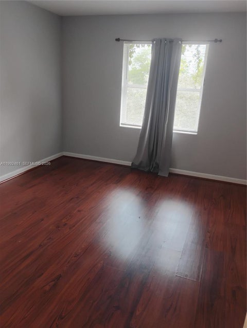 Photo of 3748 NW 91st Ln #3748, Sunrise, FL 33351 (MLS # A11992481)