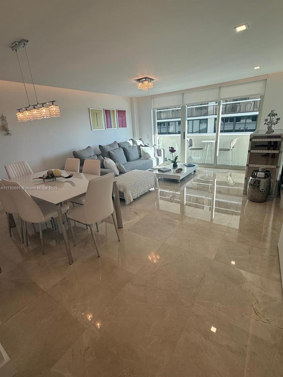9499 Collins Ave 411
