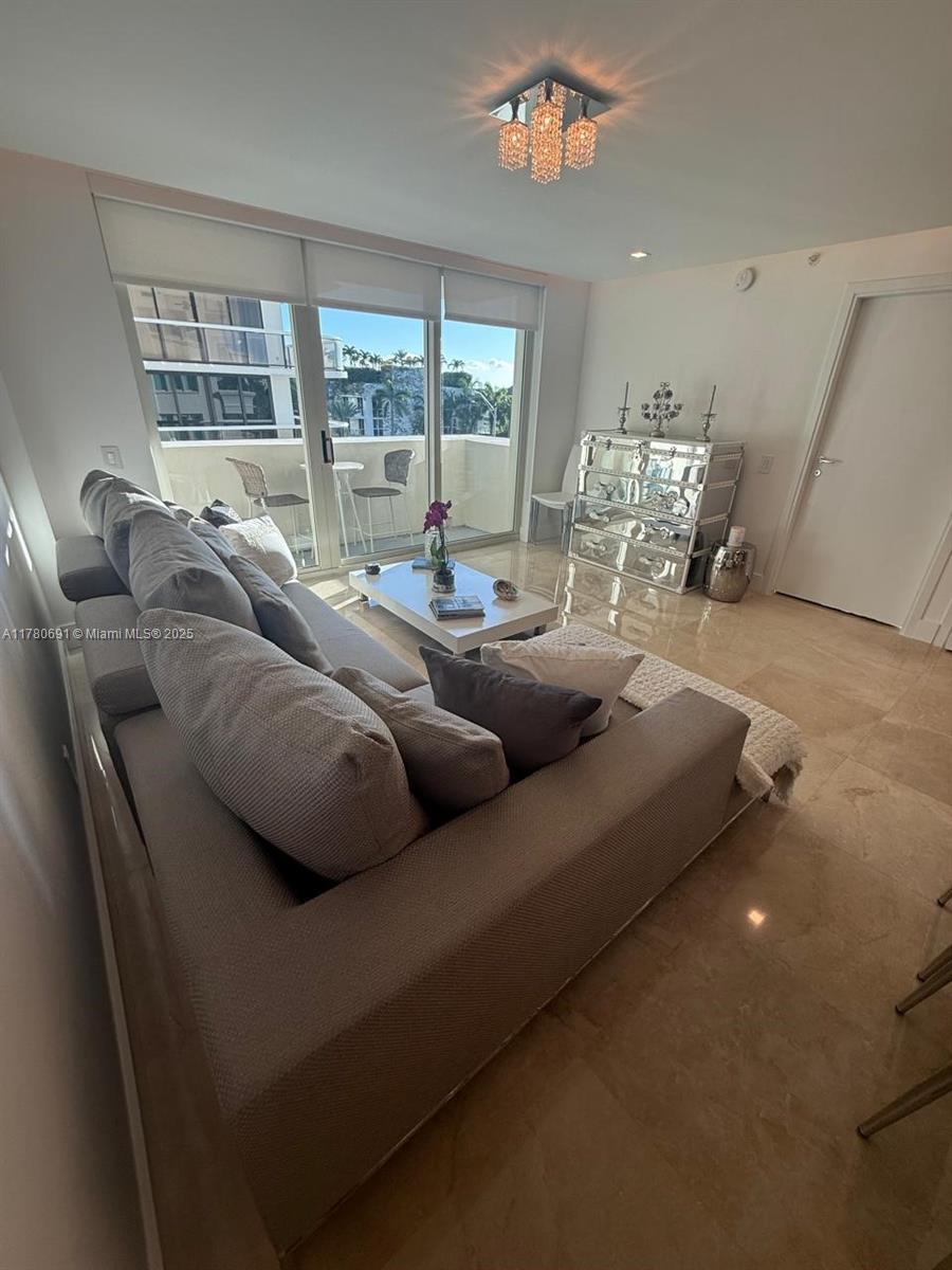 9499 Collins Ave 411