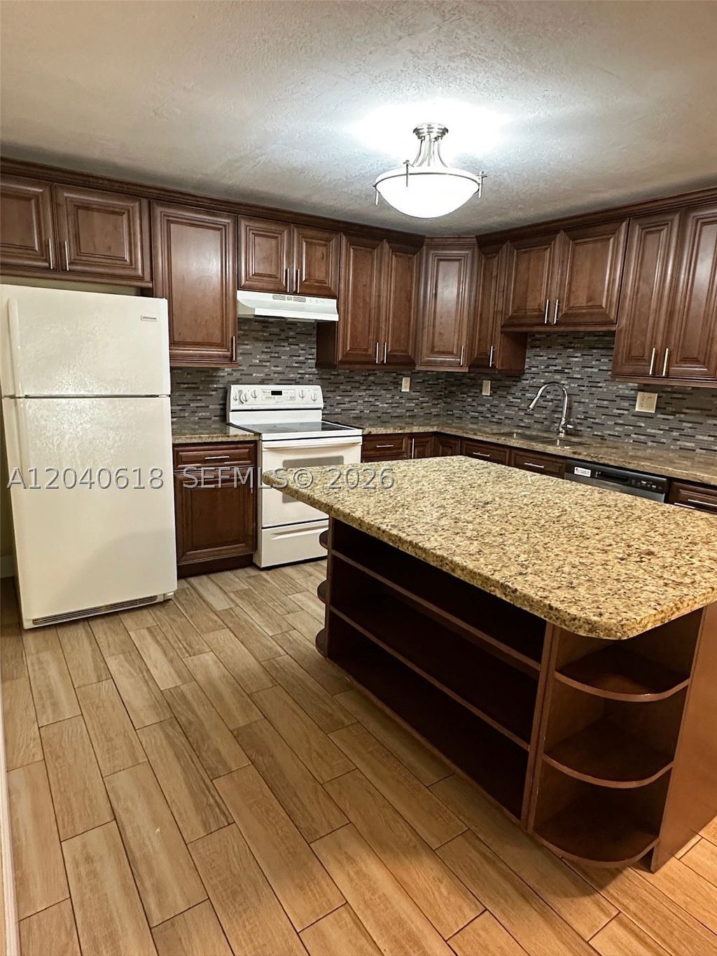Photo of 4114 NW 88th Ave #102, Coral Springs, FL 33065 (MLS # A12040618)