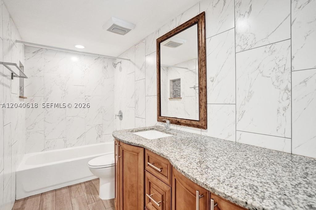 Photo of 4114 NW 88th Ave #102, Coral Springs, FL 33065 (MLS # A12040618)