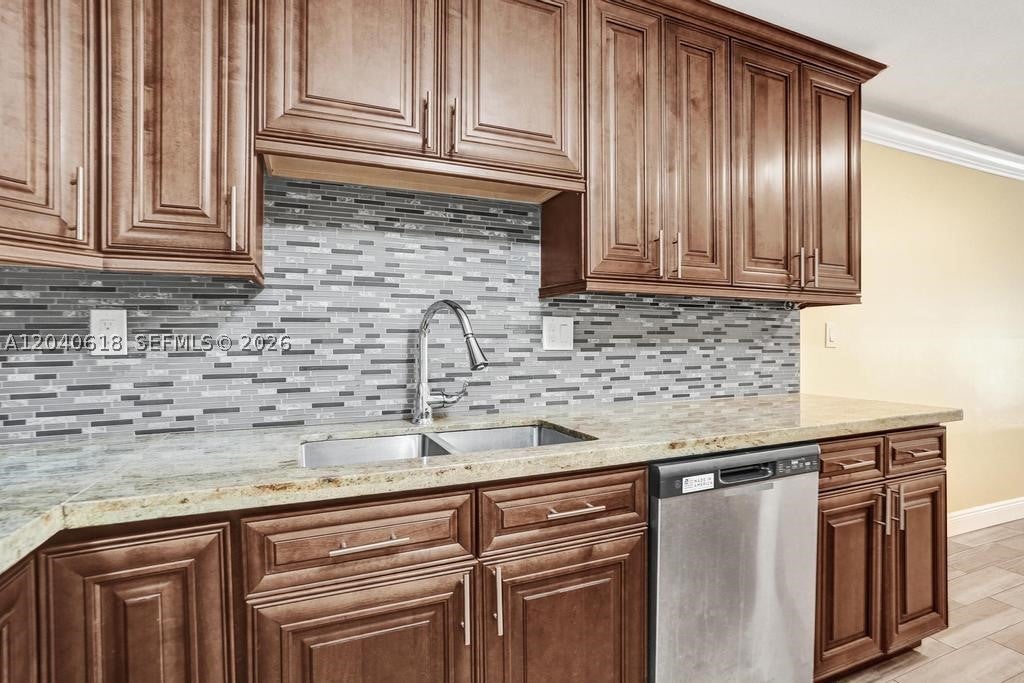 Photo of 4114 NW 88th Ave #102, Coral Springs, FL 33065 (MLS # A12040618)