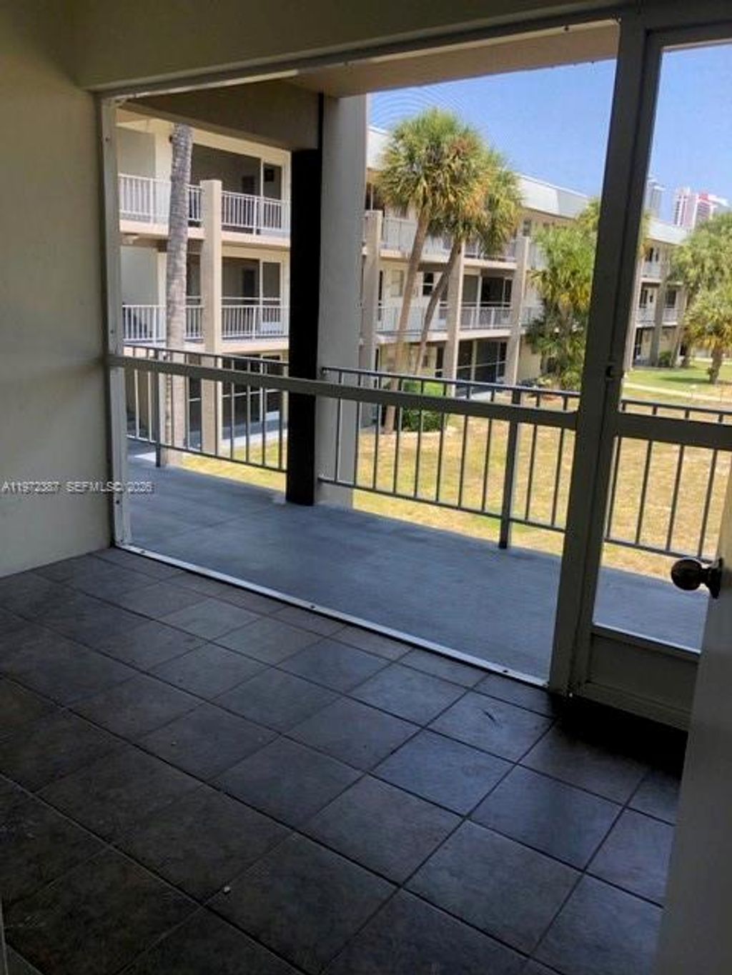 Photo of 270 Layne Blvd #211, Hallandale Beach, FL 33009 (MLS # A11972387)