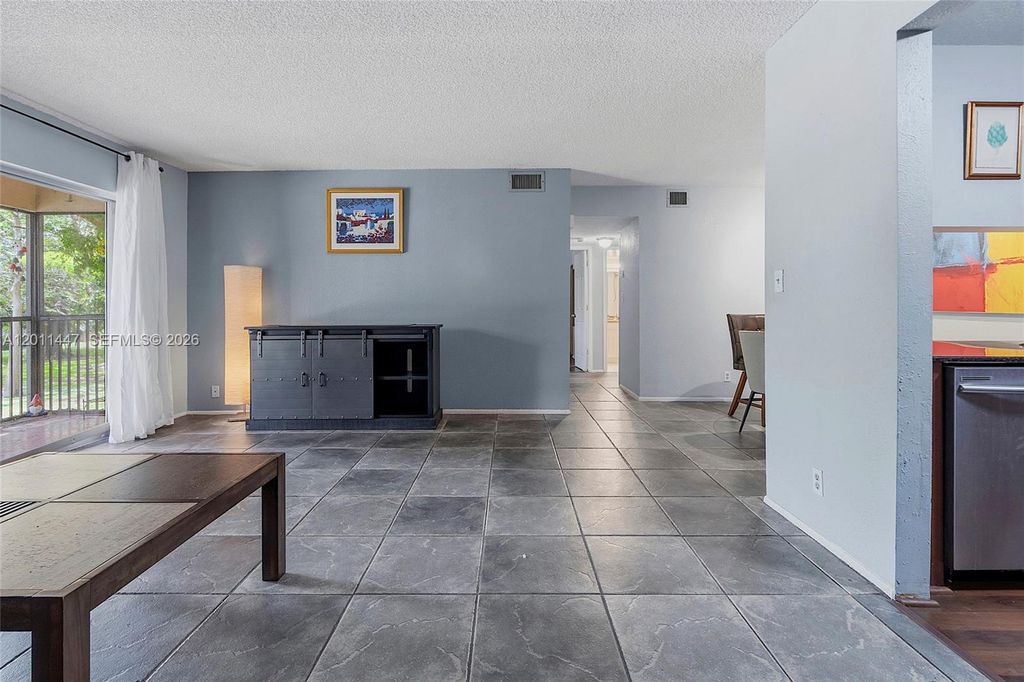 Photo of 3083 N Oakland Forest Dr #206, Oakland Park, FL 33309 (MLS # A12011447)