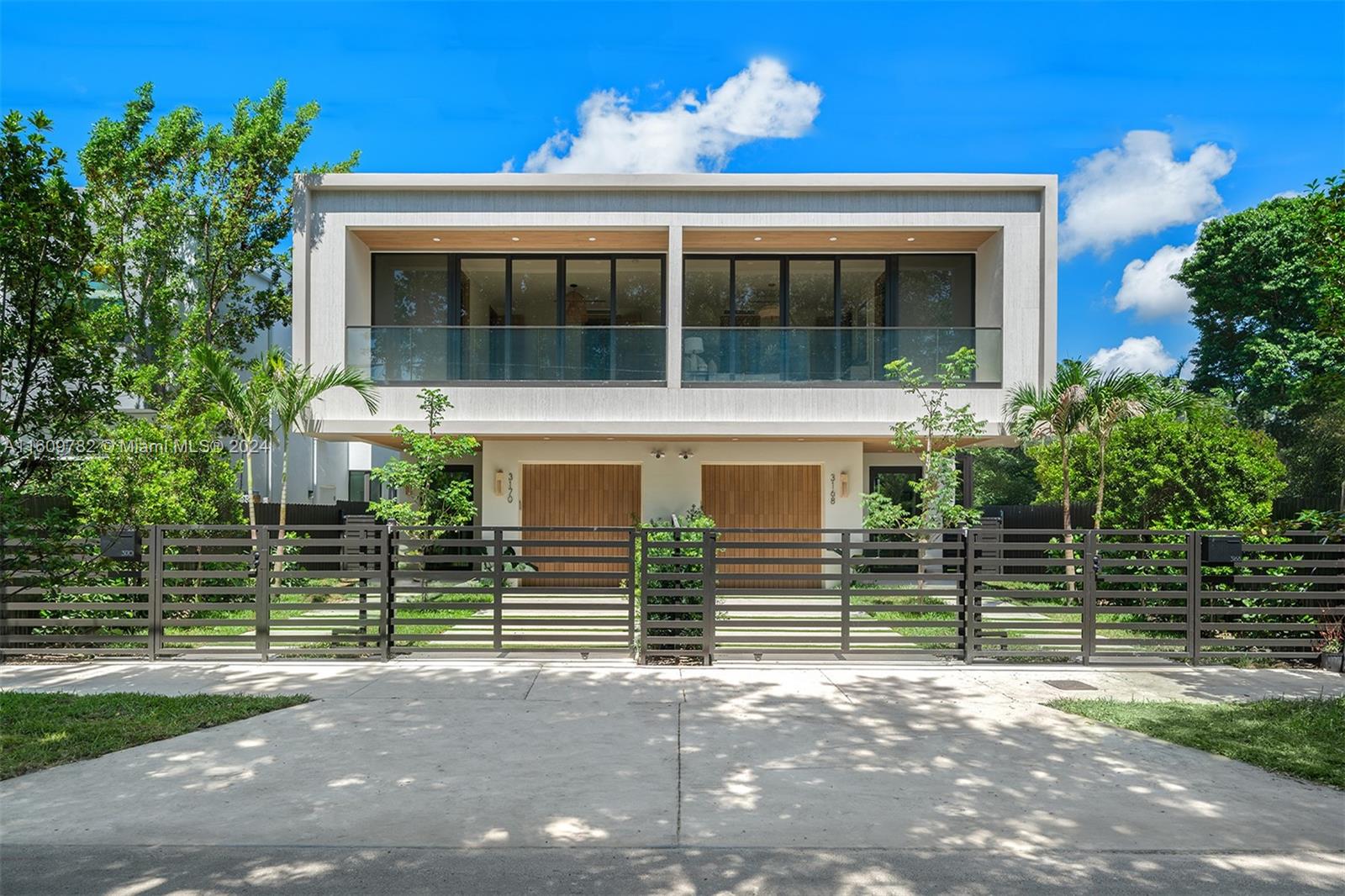 Custom new construction, by Rez Development, these two-story townhome in the heart of Coconut Grove, with a total area of 3,066 SF and a sizable 4-BD, 3.5-BA layout. Featuring designer finishes, Consentino stone exteriors, and a seamless blend of indoor and outdoor spaces. The gourmet eat-in kitchen includes MandiCasa Italian custom cabinetry, Thermador appliance package, and beautiful Consentino countertops. Additional features include 8-ft Italian doors, 10-ft ceilings, glass railings, high-efficiency lighting, exterior cameras, and garage. The manicured backyard offers artificial turf and a pool, with plenty of space to entertain. Close to the best restaurants, schools, shopping, parks, and entertainment.