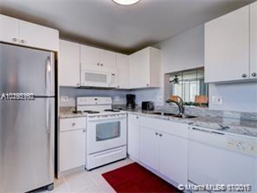 Completely renovated unit with stunning kitchen, bathrooms. Perfect unit for someone that is looking for a turnkey unit. Unit being sold with designer furniture. New lighting, carpets, furniture, new bathrooms. In the heart of Hallandale and a few minutes to the ocean and Gulfstream park. Unit has glassed in balcony that acts as a second room. Building welcomes all ages. The unit is bright and airy.