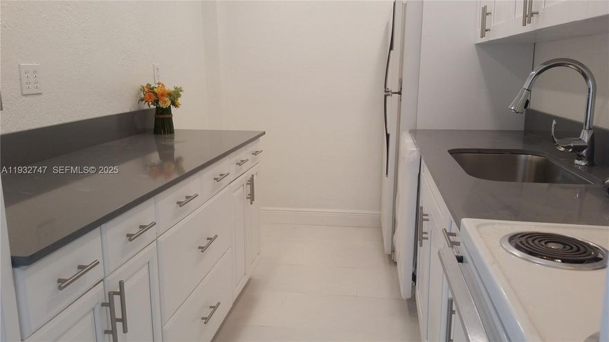 Fully Remodeled with beautiful porcelain floors, hurricane impact windows, upgraded bathroom, upgraded kitchen, quartz countertops, added lighting, and much more. Big walk in closet. Big balcony on 7th floor facing SOUTH to downtown Miami, great views! Great Building, safe, management on site, great community. Right across from Aldi on 108 st and biscayne blvd! Desirable Biscayne location with backroads and ability to get around town easy. One bedroom and a separate den, with 1.5 bathrooms - available for January 15th! 10 minutes to the Beach, 15 min to the airport, downtown, Midtown and 20 min to South Beach! the building comes with pool, gym, laundry facility, one parking space, guest lot. One parking space included.