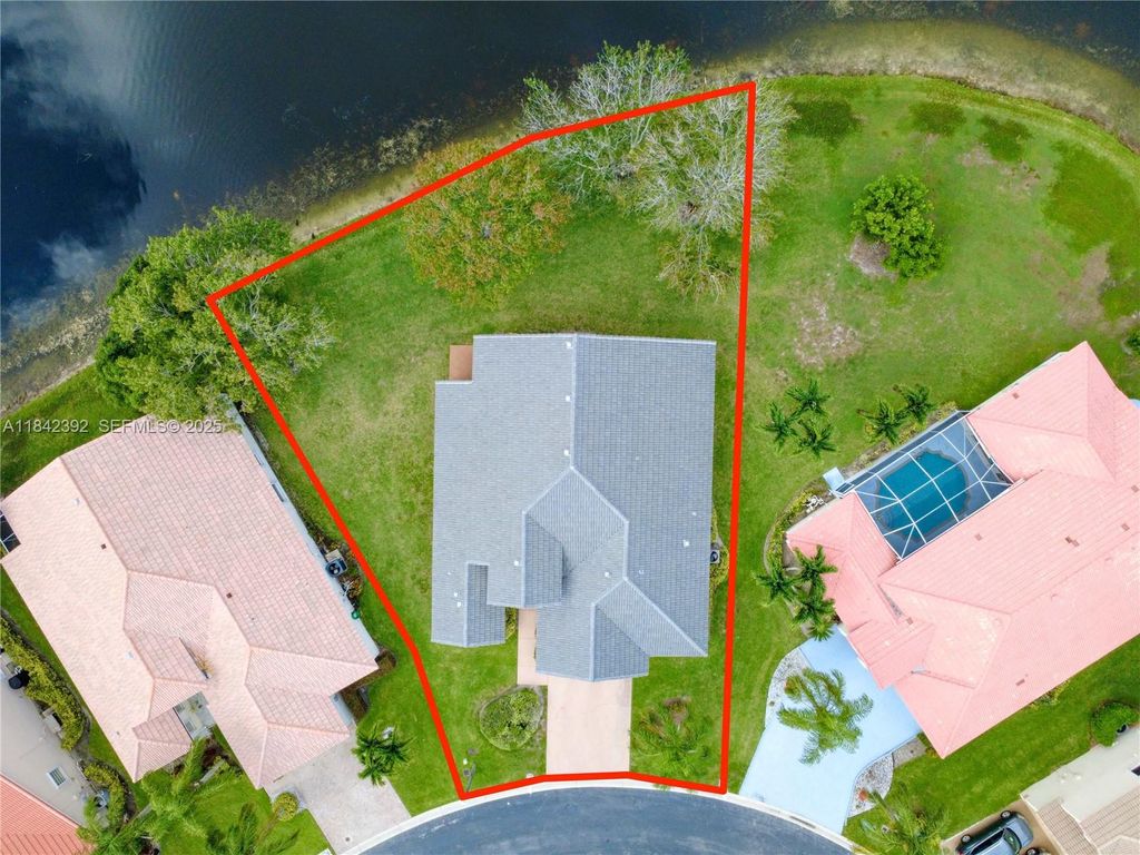 Photo of 2549 Egret Lake Dr, Green Acres, FL 33413 (MLS # A11842392)