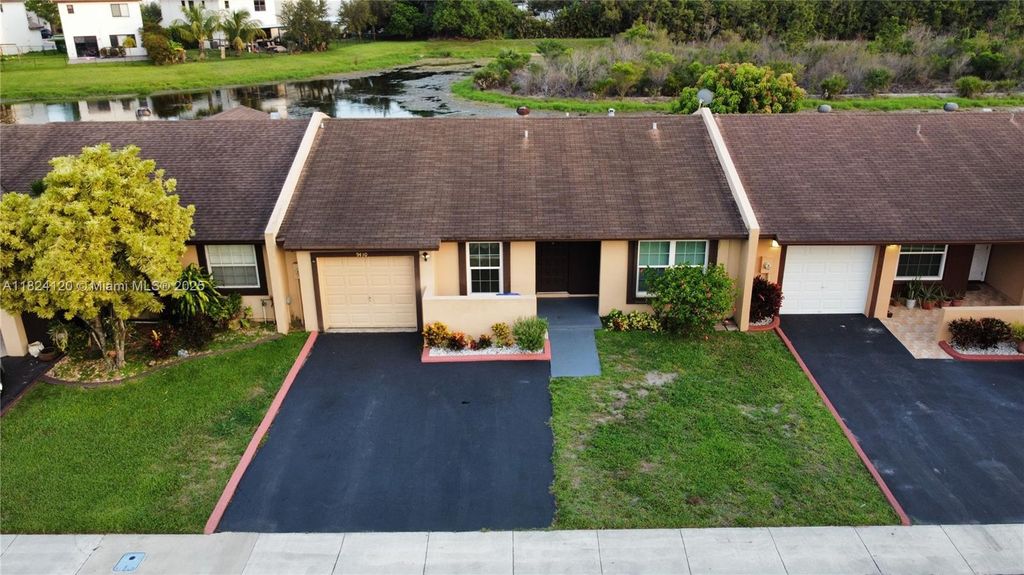 Photo of 9410 S Meadows Cir, Miramar, FL 33025 (MLS # A11824120)