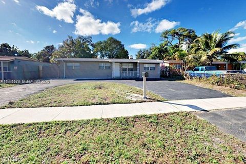 Photo of 1107 SW 22nd Ter, Fort Lauderdale, FL 33312 (MLS # A11961129)