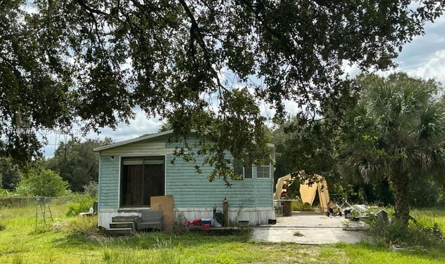 INCREDIBLE OPPORTUNITY FOR INVESTMENT! Manufactured home with great potential to generate income or increase in value with improvements, ideal for investors looking to rent. This 2-bedroom, 2-bathroom home built in 1995 offers 826 square feet of living area and sits on a 1.05-acre lot that is fully fenced, providing privacy and security. The property requires improvements, making it a perfect opportunity to add value and create steady rental income once upgraded. Located in Montura Ranches, a country living community in unincorporated Hendry County known for space, privacy, and agricultural living, this property offers plenty of room for animals, outdoor activities, or future enhancements. Zoned RR-F (Rural Residential Farm, allowing livestock based on acreage under county guidelines), giving flexibility for agricultural use. Enjoy peaceful surroundings, no HOA. Perfect for investors, owner-occupants, or anyone seeking land, freedom, and affordability. Cash only.