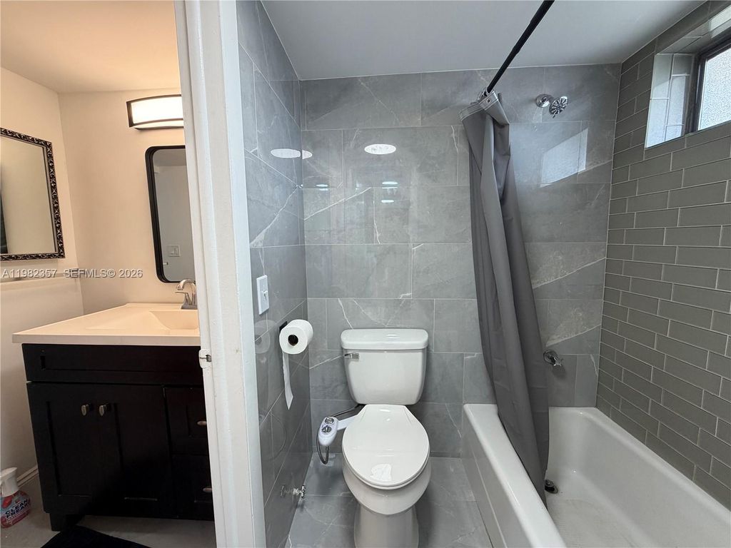 Photo of 6020 NW 64th Ave #306, Tamarac, FL 33319 (MLS # A11982357)