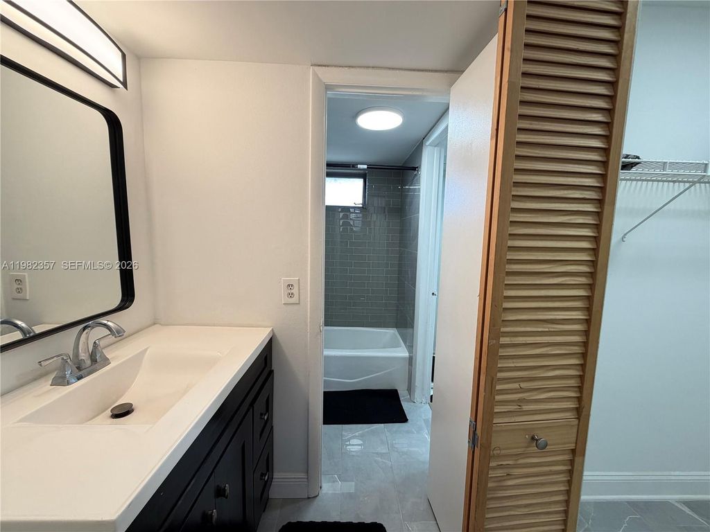 Photo of 6020 NW 64th Ave #306, Tamarac, FL 33319 (MLS # A11982357)