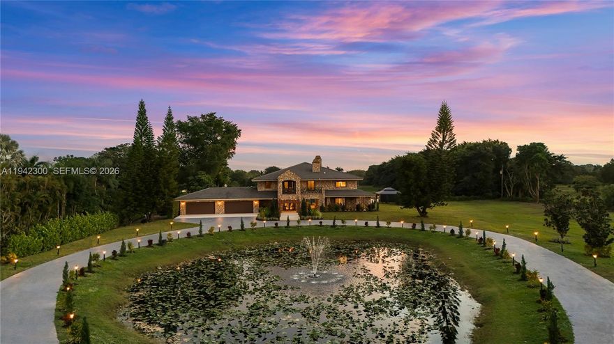 Properties like this rarely exist in South Florida. Straight out of a film, River Rock Ranch is a private estate offering over 9,000 SF on nearly 4 acres in one of Davie’s most desirable locations. Recently reimagined, this gated modern farmhouse features river rock details throughout, creating a distinctive, resort-like setting.

Designed for both everyday living and entertaining, the property offers a resort-style pool and spa, expansive event deck, and wide-open grounds surrounded by Davie’s largest ranches - ideal for those who value space, total privacy, or an equestrian lifestyle.

Inside, the home features top-of-the-line finishes, including a custom show kitchen with a separate chef’s kitchen, European-style cabinetry, high-end appliances, full smart home system, and a game room/lounge, all within a refined modern farmhouse aesthetic. A private gated entrance and 8’+ fencing provide exceptional seclusion.

Conveniently located near major highways, top-rated schools including American Heritage, approximately 20 minutes from FLL, minutes to Sawgrass Mills, and with easy access to Fort Lauderdale and Miami. Seller open to discussing the additional 5 acres, offering the rare opportunity to create a nearly 9-acre estate.
Fully furnished, move-in ready.